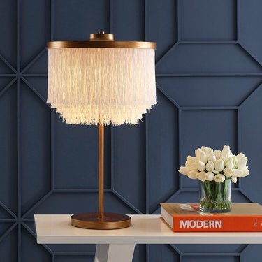 metal table lamp with fringe shade
