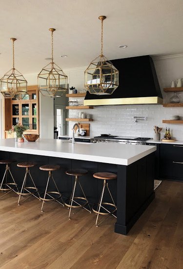 modern kitchen with black island