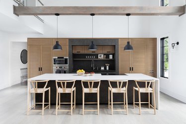 modern kitchen with black island