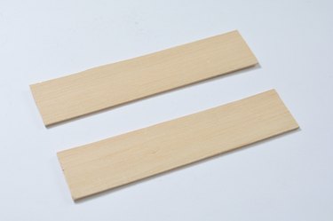 Two rectangular shelf pieces of basla wood.