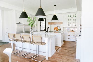 white kitchen with double white islands