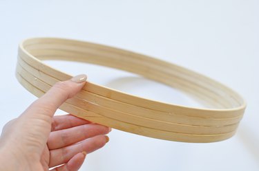 Wooden hoops glued together.