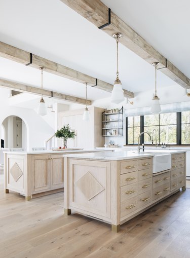 double wooden islands in farmhouse kitchen