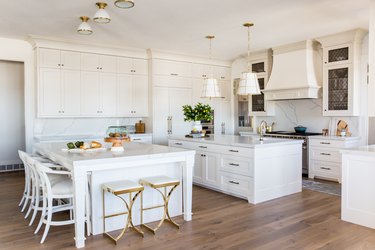white kitchen with double islands