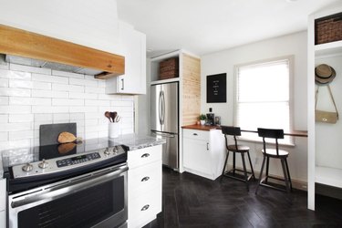 Herringbone black tile farmhouse kitchen floor