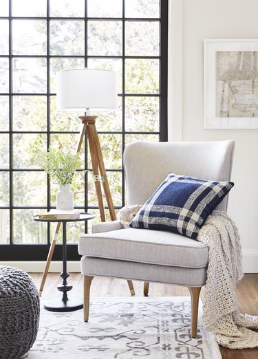 Chair with throw pillow in traditional living room