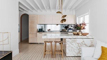 extra thick Calacatta marble countertops in neutral kitchen