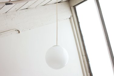 Ball-shaped midcentury pendant light