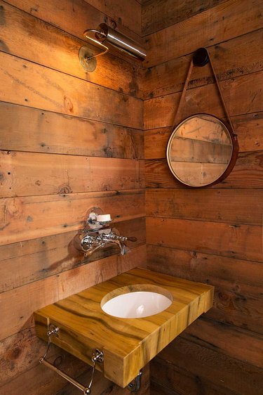 floor to ceiling reclaimed wood walls and