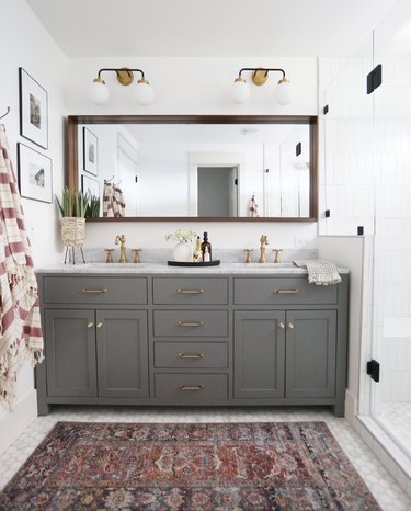 double vanity bathroom wall lighting idea above rectangular mirror