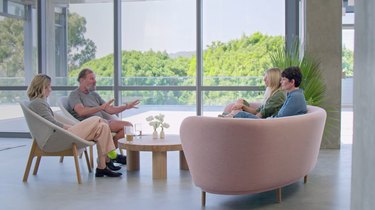 screenshot from the goop lab of sitting area with pink sofa