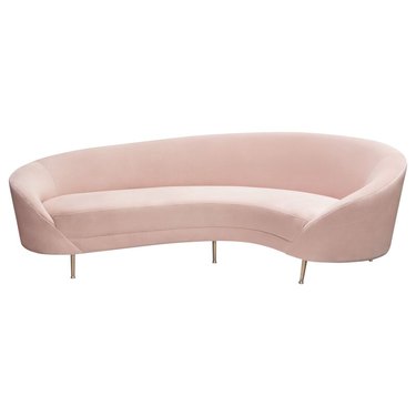 pink curved sofa