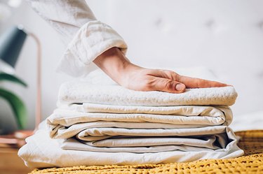 Stack of folded bed sheets