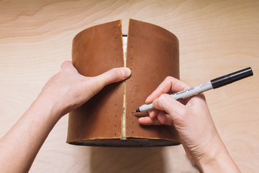 Marking dots on leather that is wrapped around planter