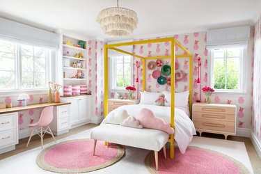 boho girls room with pink pineapple wallpaper