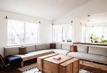 family room furniture with built-in sectional and wooden chest coffee table