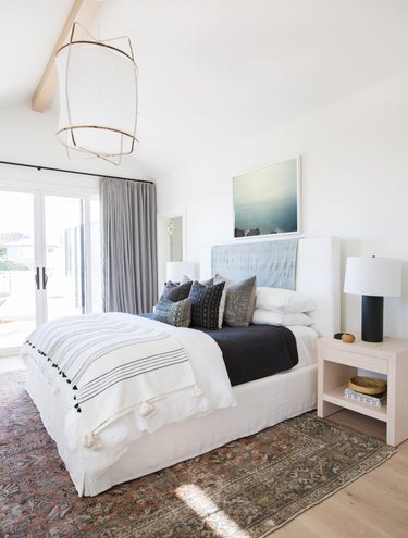 bright white guest bedroom idea with French doors