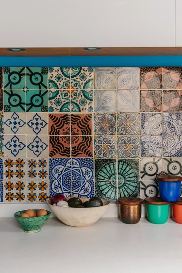 patterned kitchen tiles with colourful containers