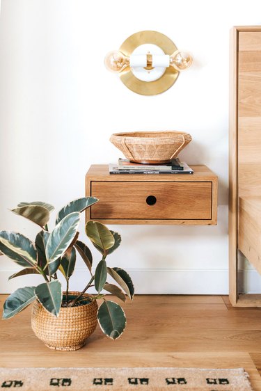 clean minimalist bedroom with floating drawer