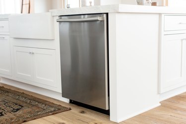 view of stainless steel dishwasher in kitchen island