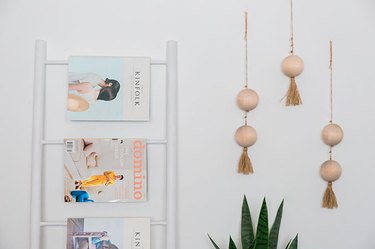 This multi-piece DIY Wood Bead Wall Hanging adds neutral style to your space.