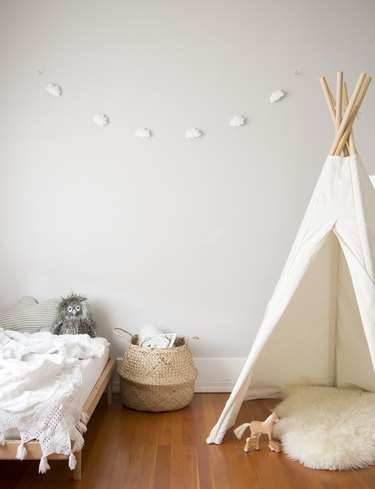 gray minimalist girl bedroom with fort