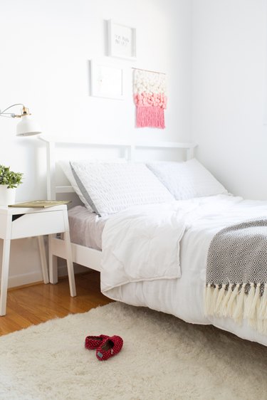 white and gray minimalist girl bedroom with shag rug