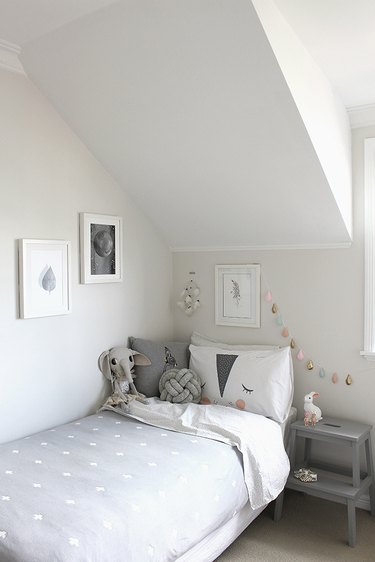 gray minimalist girl bedroom with dreamcatcher