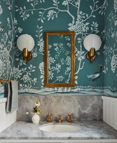 elegant bathroom lighting idea with vintage inspired sconces