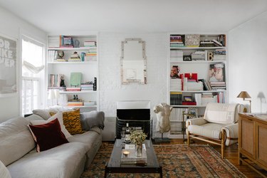 white painted brick fireplace