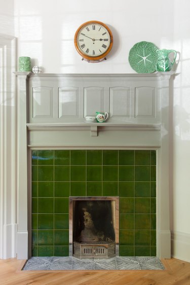 arts and crafts interior with green tiled fireplace