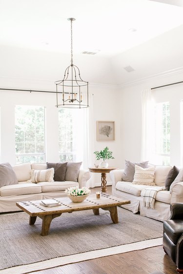 coastal family room with reclaimed wood coffee table