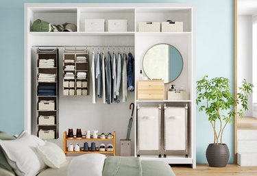 closet system organizer in white and blue bedroom