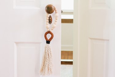 Tassel and beads hung on doorknob