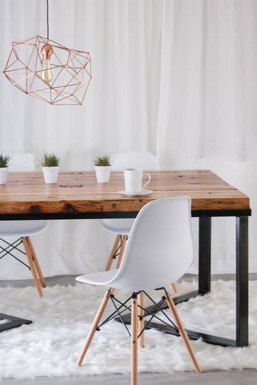 DIY minimalist dining table in metal and reclaimed wood