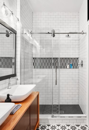 black and white bathroom with shelf shower storage ideas