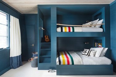 minimalist with color in blue room with bunkbeds