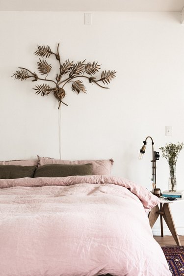 Bed with pink bedspread