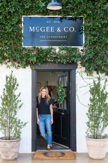 Shea from Studio McGee standing in door way of storefront