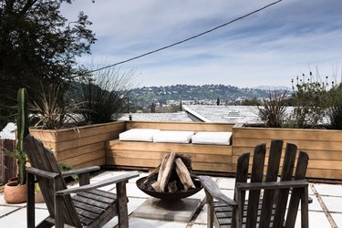 Backyard patio with chairs and firepit