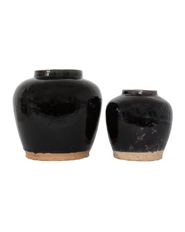 Two black ceramic jars