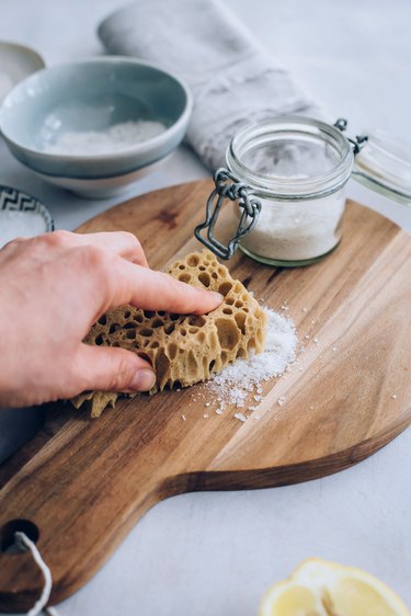 Using wooden cutting board scrub to disinfect