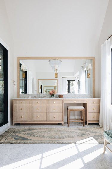 natural wood bathroom makeup vanity with large mirror