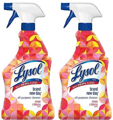 two bottles of lysol spray with colorful packaging