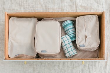 Use packing cubes in your drawers exactly as you would a suitcase!