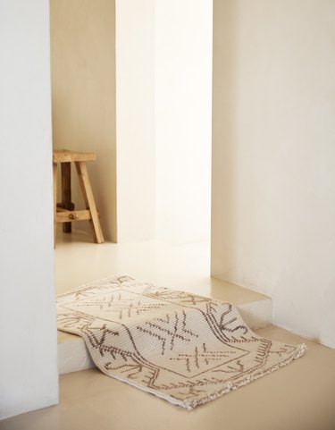 patterned rug in hallway