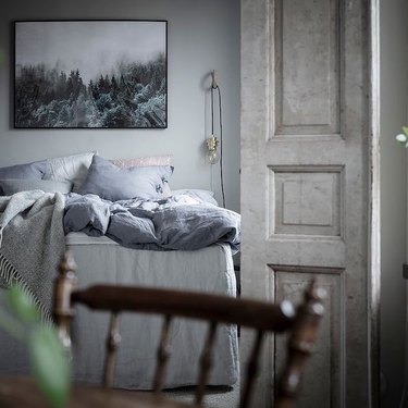 Scandinavian farmhouse style bedroom with grayish blue palette