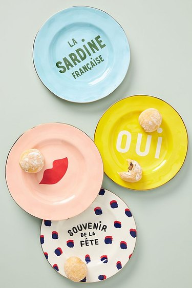 four colorful plates with french text