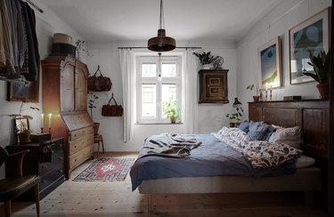 Scandinavian farmhouse style bedroom with wood furniture