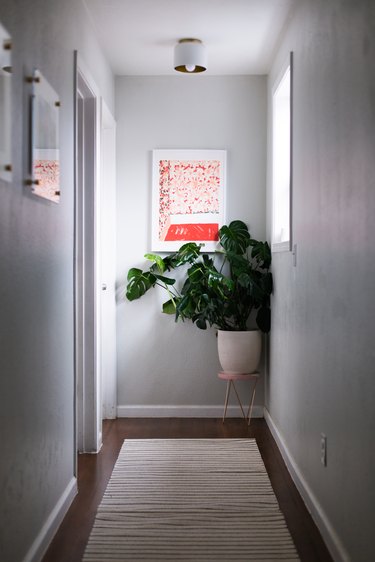 midcentury modern hallway lighting with small ceiling light.